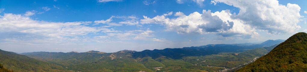 Fototapeta na wymiar Beautiful view of the mountain peaks on a summer day.