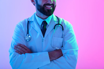Portrait of a confident young man doctor wearing uniform