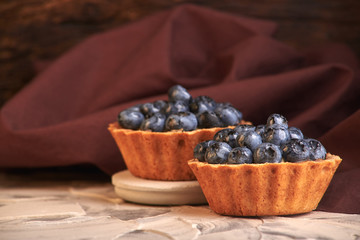 homemade sweet cakes with blueberry berries. delicious home baking