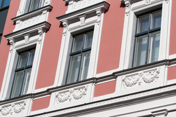 Obraz premium Beautiful view of renovated home in Latvia Capital Riga, with fantastic exterior with details and sculptures.