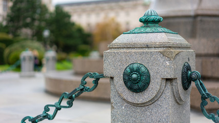 Fototapeta premium Stand Chain Barriers On Sidewalk