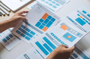 Website designer Creative planning application developer development draft sketch drawing template layout prototype framework wireframe design studio . User experience concept .