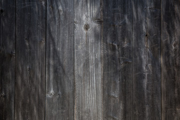 Dark wood texture with clear patterns.