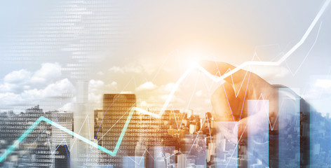 Multi exposure of financial chart, cityview and binary codes