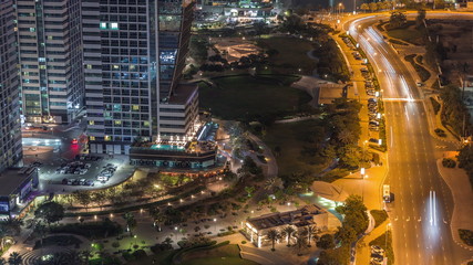 Jumeirah Lake Towers residential district aerial night timelapse near Dubai Marina