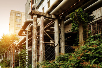 Rusty pipes, through many years.