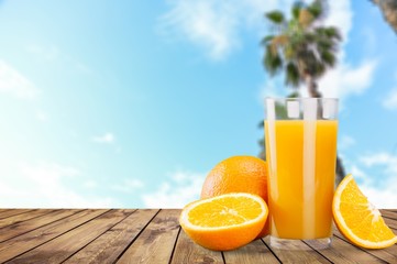 Orange juice and slices of orange on background © BillionPhotos.com