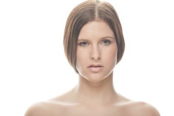 portrait of a young woman in front of a bright background