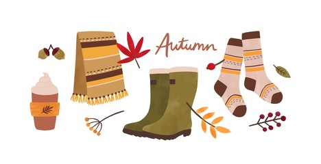 Autumn accessories hand drawn vector illustration. Traditional fall season attributes and typography composition. Foliage, berries warm clothes and creamy drink isolated on white background. © Good Studio