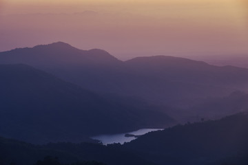 Sunlight with the sun's rays illuminate the beautiful mountain.