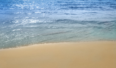 wave on sandy tropical beach
