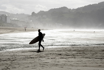 shape of surfer on Zarauz beach,Basque coast