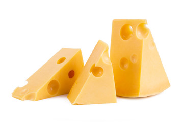 pieces of tasty yellow cheese isolated on white background