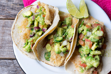 Mexican chicharron tacos with guacamole also called 