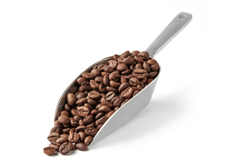Obraz premium Coffee beans and serving scoop