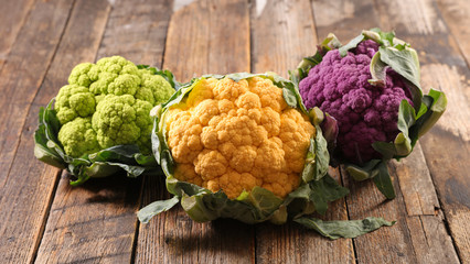 different sort of cauliflower on wood background