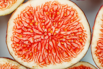 Figs are ripe. Close-up of chopped figs in the form of a texture inscribed in a rectangle. Macro