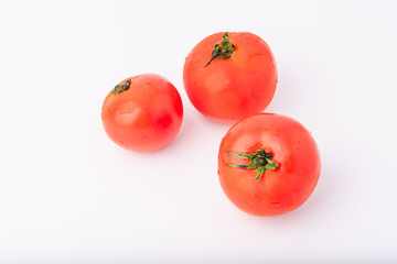 Tomatoes, isolated on a white background, the concept of healthy eating Helps to nourish the skin to be moisturized, bright, not dry.
