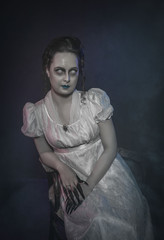 Ghost woman in white victorian dress. Halloween scene