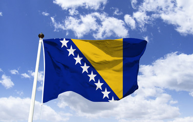 Bosnia and Herzegovina Flag Mockup, blue and yellow with isosceles triangles, seven white five-pointed stars and two half stars. The ends of the triangle symbolize the trinational theory of Bosnia.