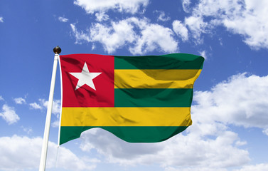 Flag of Togo, a West African nation located in the Gulf of Guinea, known for its palm-fringed beaches. In the capital Lomé, there are the markets: Grand Marché and Akodessewa, which sells talismans.