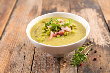 green pea soup with bacon and parsley