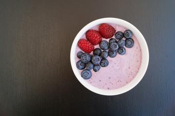 Homemade healthy yogurt with muesli and blueberries.