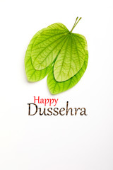 Dussehra greeting card using apta / Bauhinia racemosa