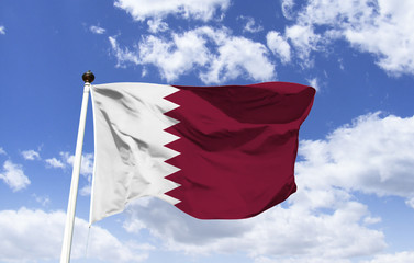 Qatar, Middle East flag mockup floating under a blue sky. Arabian Peninsula, the landscape covers...