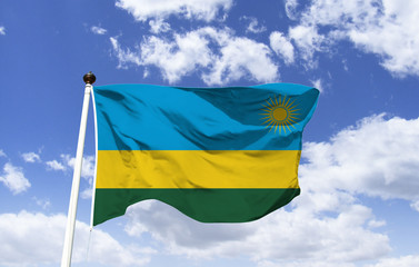 Rwanda Flag Template floating under the blue sky. East African Country. The famous Volcano National Park covers Mount Karisimbi. In the southwest, Nyungwe National Park. Capital: Kigali