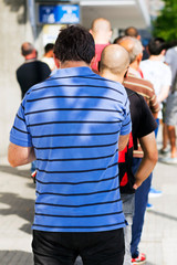 people  queue  in  line up ,  draggle , selective focus