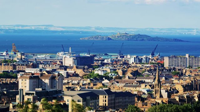 Time lapse panning view of East Edinburgh, Leith and the firth of forth in Scotland