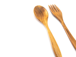 spoon and fork  wooden isolated on white background with selective focus.