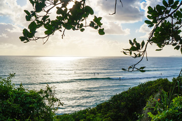 Stunning view of the Pacific Ocean and surfers catching waves in Tallebudgera Creek, visible from...