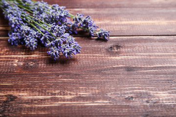 Lavender flowers on brown wooden table