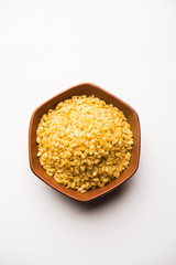 Salty and Fried Moong Dal Namkeen served in a bowl, selective focus