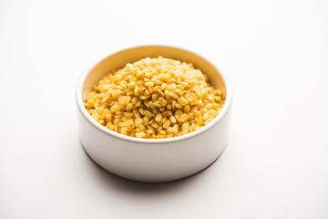 Salty and Fried Moong Dal Namkeen served in a bowl, selective focus