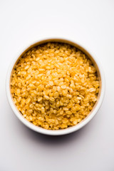 Salty and Fried Moong Dal Namkeen served in a bowl, selective focus