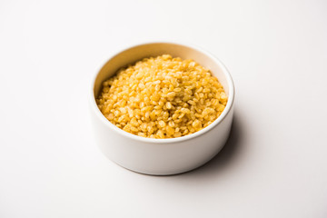 Salty and Fried Moong Dal Namkeen served in a bowl, selective focus