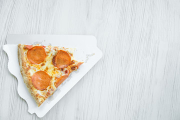slice of pizza on the table