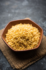 Salty and Fried Moong Dal Namkeen served in a bowl, selective focus
