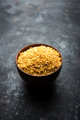 Salty and Fried Moong Dal Namkeen served in a bowl, selective focus