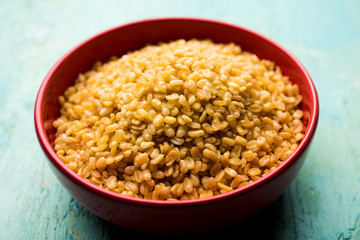 Salty and Fried Moong Dal Namkeen served in a bowl, selective focus