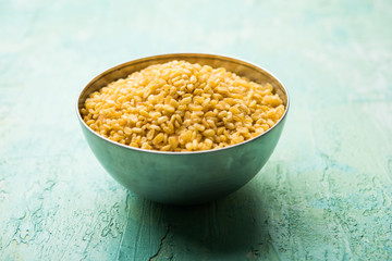Salty and Fried Moong Dal Namkeen served in a bowl, selective focus