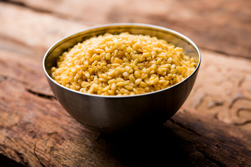 Salty and Fried Moong Dal Namkeen served in a bowl, selective focus
