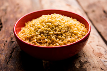 Salty and Fried Moong Dal Namkeen served in a bowl, selective focus
