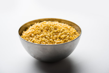 Salty and Fried Moong Dal Namkeen served in a bowl, selective focus