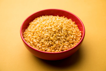 Salty and Fried Moong Dal Namkeen served in a bowl, selective focus