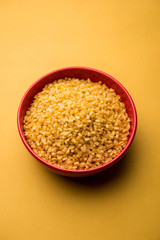 Salty and Fried Moong Dal Namkeen served in a bowl, selective focus