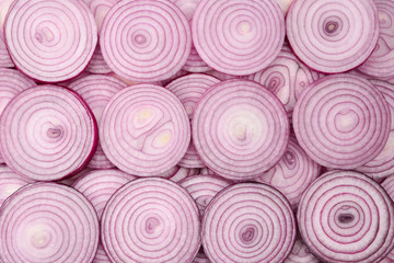 Onion slices as a background. Top view.
